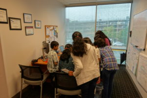 Staff visit with children